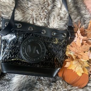 Michael Kors, clear and black MK lettering  tote. Crossbody strap